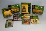 Nine various John Deere tractor toys