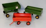 Three John Deere wagons