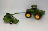 John Deere tractor and attachment