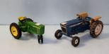 4600 blue Ford tractor and John Deere tractor