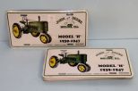 Twelve John Deere tags