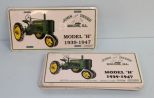 Twelve John Deere tags