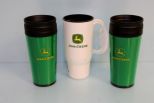 Three John Deere thermos cups