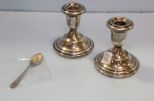 Pair of Sterling Weighted Candlesticks & Spoon