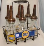 Six Reproduction Gulf Oil Bottes in Metal Holder