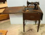 Sewing Machine in Cabinet