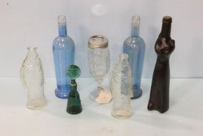 Six Bottles & Fruit Jar on Stand