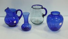 Two Large Glass Pitchers & Two Blue Vases 