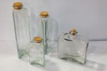 Four Glass Canisters
