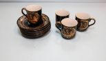 Four Black and Gold Cups & Six Saucers