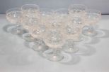 Twelve Unmarked Champagne Glasses