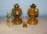 Two Amber Oil Lamps