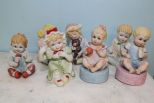 Seven Bisque Figurines of Children