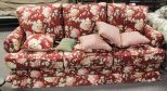 Three Cushion Red Sofa with Flowers