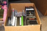 Box of VHS Tapes & DVDs