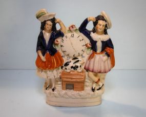 Staffordshire Figurine of Girls & Rabbit Clock