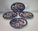 Four Blue Willow Platters