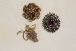 Lot of three Purple Rhinestone Brooches