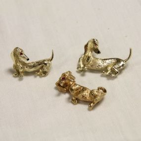 Three brushed Gold Tone Dog Pins 