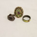 Three costume jewelry rings.