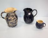 Three Various Size Spongeware Pitchers