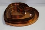 Four Heart Shaped Copper Trays 