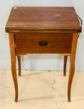 Sewing Machine in Mahogany Cabinet