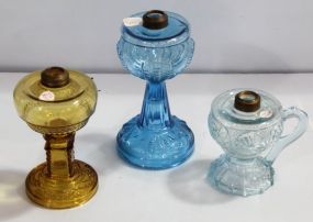 Three Various Sized Oil Lamps