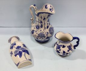 Two Blue and White Pitchers & Flat Wall Vase