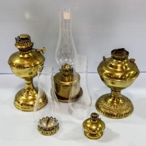 Four Various Brass Lamps
