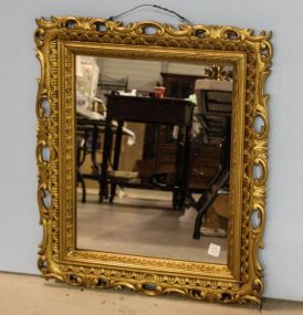 Mirror in Gold Plastic Frame