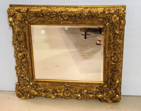 Beveled Mirror in Gold Carved Frame