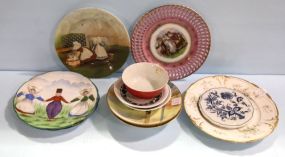 Eleven Hand Painted Plates