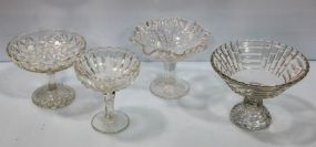 Four Pressed Glass Compotes