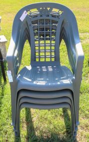 Four Plastic Arm Chairs