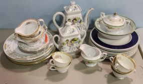 Porcelain Teapot, Sugar, Creamer & Sugars Dinner Plates