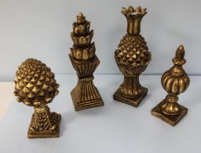 Four Pineapple Statues