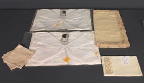 Two Sets of Vintage Tablemats and Set of Ecru Linen Napkins Description