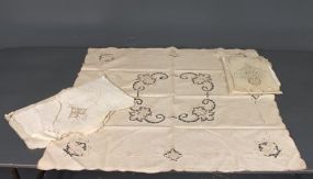 Group of Beige Linen and Ecru Embroidery Doilies and Tablecloth Description