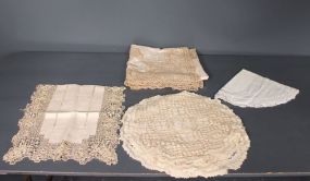 Linen Tablecloth with Various Doilies Description