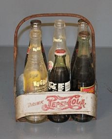 Pepsi Cola Carrier with Old Soda Bottles