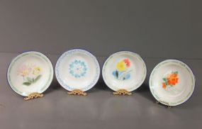 Four Hand Painted Plates
