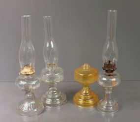 Four Glass Oil Lamps
