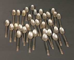 Thirty Three Pieces of W.M. Rogers Commemorative Spoons