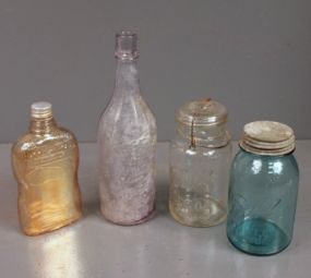 Group of Four Glass Jars