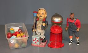 Vintage Hand Juicer, Mr. T. Doll, and Down the Hatch Doll