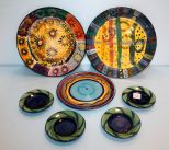 Eight Various Size Painted Pottery Plates