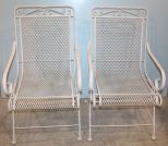 Two White Wrought Iron Chairs