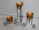 Three Candleholders on Metal Stands