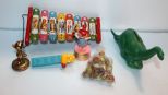 Plastic Dinosaur Bank, Marbles, Pebbles Puppet, Pez & Brass Mickey Mouse